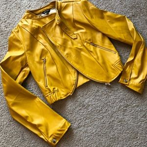 Faux leather cropped motto jacket